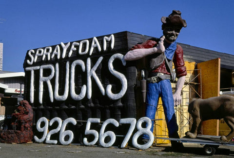 Historic Photo : 1987 Spray foam trucks prospector statue and sign, overall view, Frontage Road, I-5, Albany, Oregon | Photo by: John Margolies |