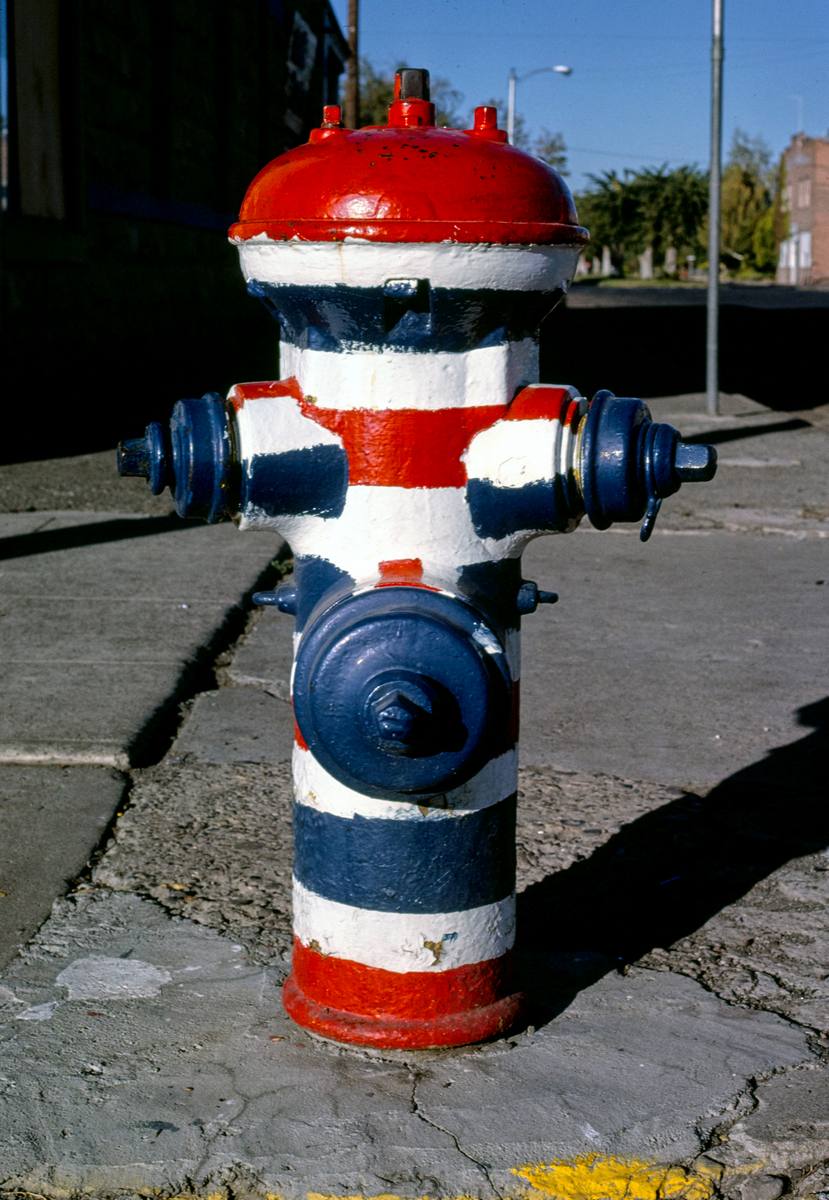 Historic Photo : 1987 Barber pole, (fire hydrant), Wapato Avenue, Wapato, Washington | Margolies | Roadside America Collection | Vintage Wall Art :