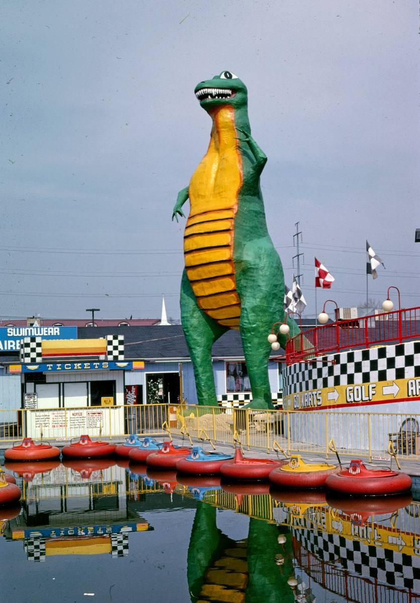 Historic Photo : 1992 Rebel Yell Raceway dinosaur statue, Route 441, Pigeon Forge, Tennessee | Margolies | Roadside America Collection | Vintage Wall Art :