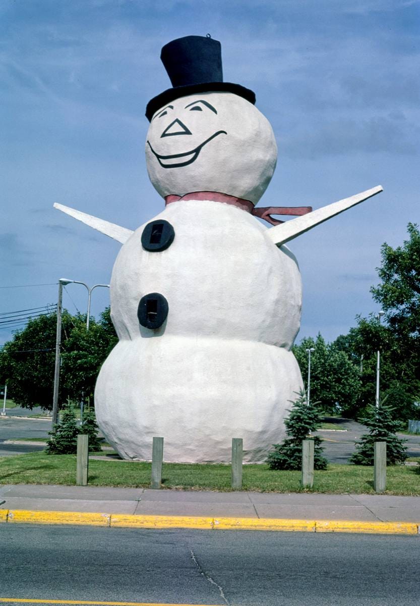 Historic Photo : 1984 Snowman statue, angle 2, Margaret Street, North St. Paul, Minnesota | Margolies | Roadside America Collection | Vintage Wall Art :