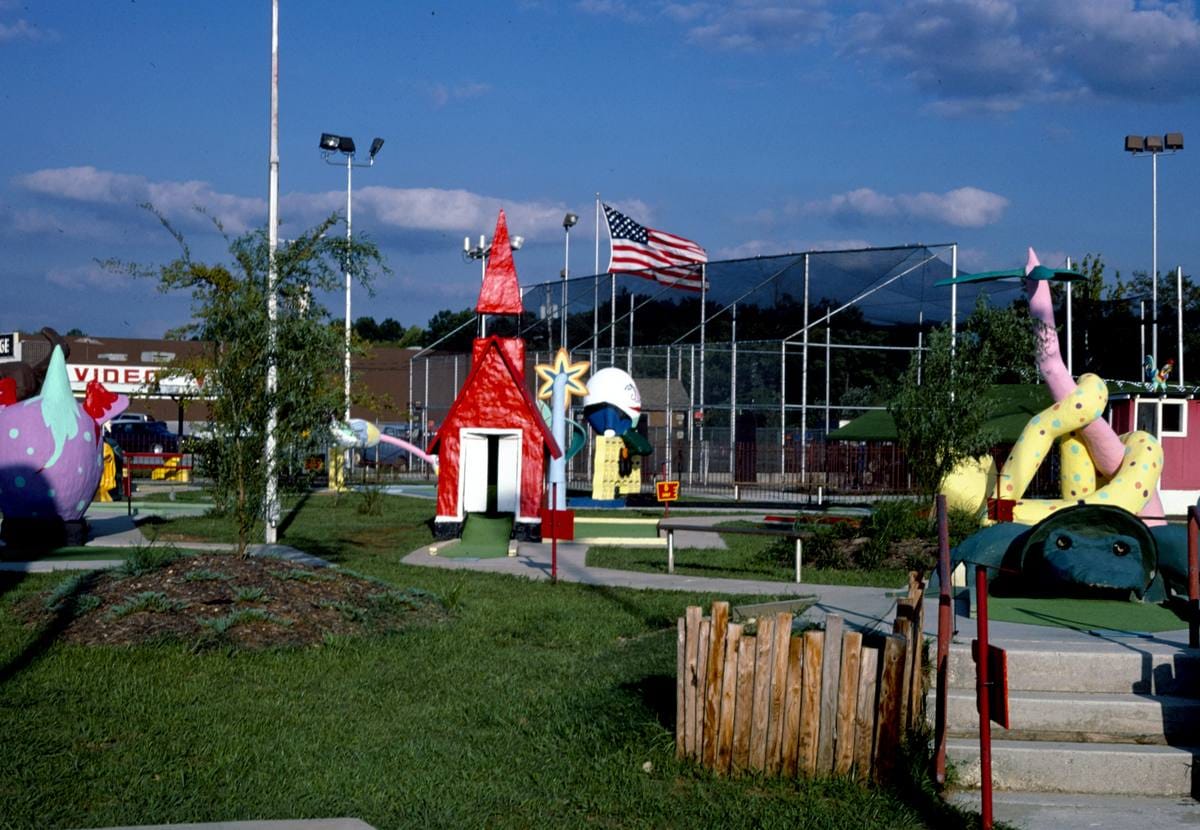 Historic Photo : 1986 Overall, church and Humpty Dumpty, Sir Goony Golf, Chattanooga, Tennessee | Margolies | Roadside America Collection | Vintage Wall Art :