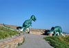Historic Photo : 1987 Tyrannosaurus and triceratops, Dinosaur Park, tire, Uniroyal, Rapid City, South Dakota | Margolies | Roadside America Collection | Vintage Wall Art :