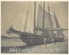 Photo Print : Rudolph Eickemeyer - Ships on a Beach with Two Long Boats and Two Men Sweeping : Vintage Wall Art