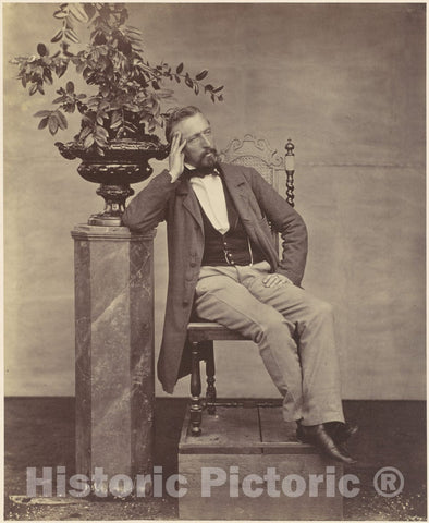 Photo Print : Franz Antoine - Mathias Höusermann Seated with Elbow on Pedestal Holding a vase of Flowers : Vintage Wall Art