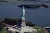 New York, NY Photo - Statue of Liberty with Ellis Island in The Background, New York