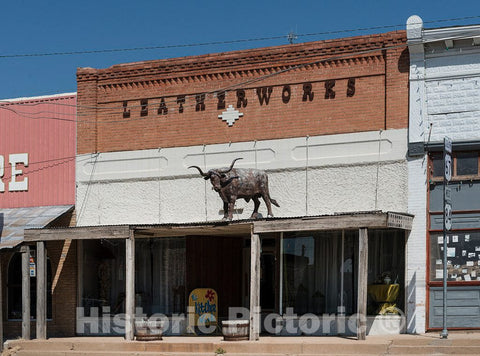 Photo - A Leather Shop with a Distinctive Advertising Symbol on The roof of its Canopy in Downtown Santa Anna, a Town in Coleman County in Central Texas