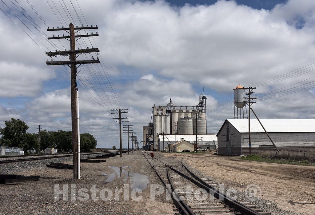 Holly, CO Photograph - View from down the tracks at the Northern Ag Service Inc. grain elevator and related equipment in the town of Holly, near the Kansas line in Prowers County, Colorado