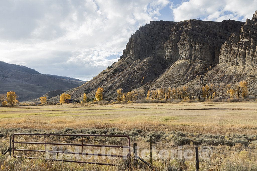 Grand County, CO Photo - Meadow and bluffs in autumn, near Hot Sulphur Springs in Grand County, CO.