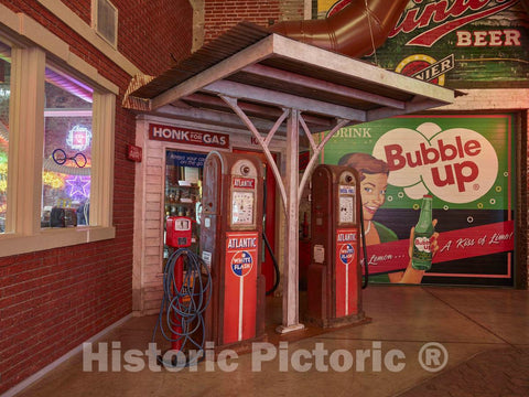 Photo - an Example of an Early Highway Gasoline Station, as Well as a Small Sample of Exuberant Advertising Signs at The American Sign Museum in The Industrial Camp