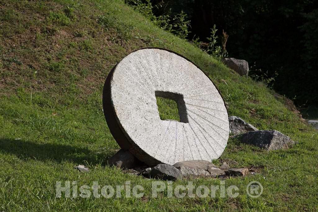 Photo- Grinding Wheel at The Entrance to The Old Mill of Guilford, Also Known as Bailes' Old Mill, a Historic and Still-Working grist Mill Near Oak Ridge in Guilford County