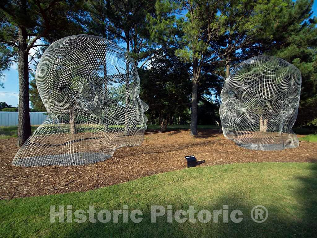 Photograph - Jaume Plensa's"Awilda & Irma" mother-and-daughter stainless-steel sculptures, on loan from the collection of Stuart Miller, at the North Carolina Museum of Art in Raleigh 2