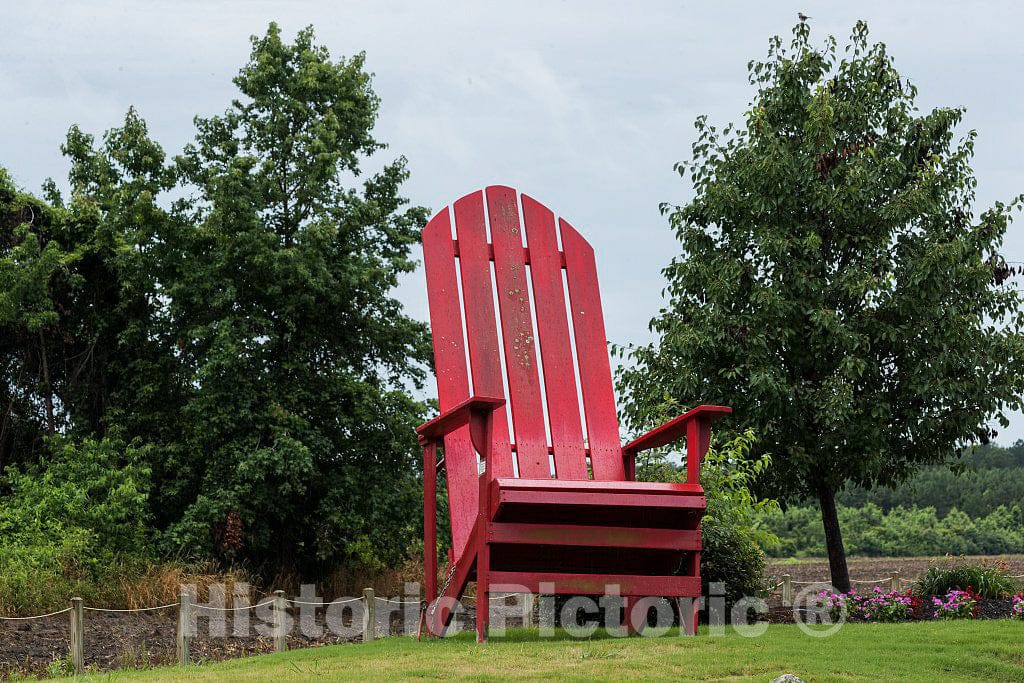 Photo - They Make Their Beach Chairs, at Least This one, Really Big in Grandy, North Carolina and This one Sits Outside an Ace Hardware Store- Fine Art Photo Reporduction