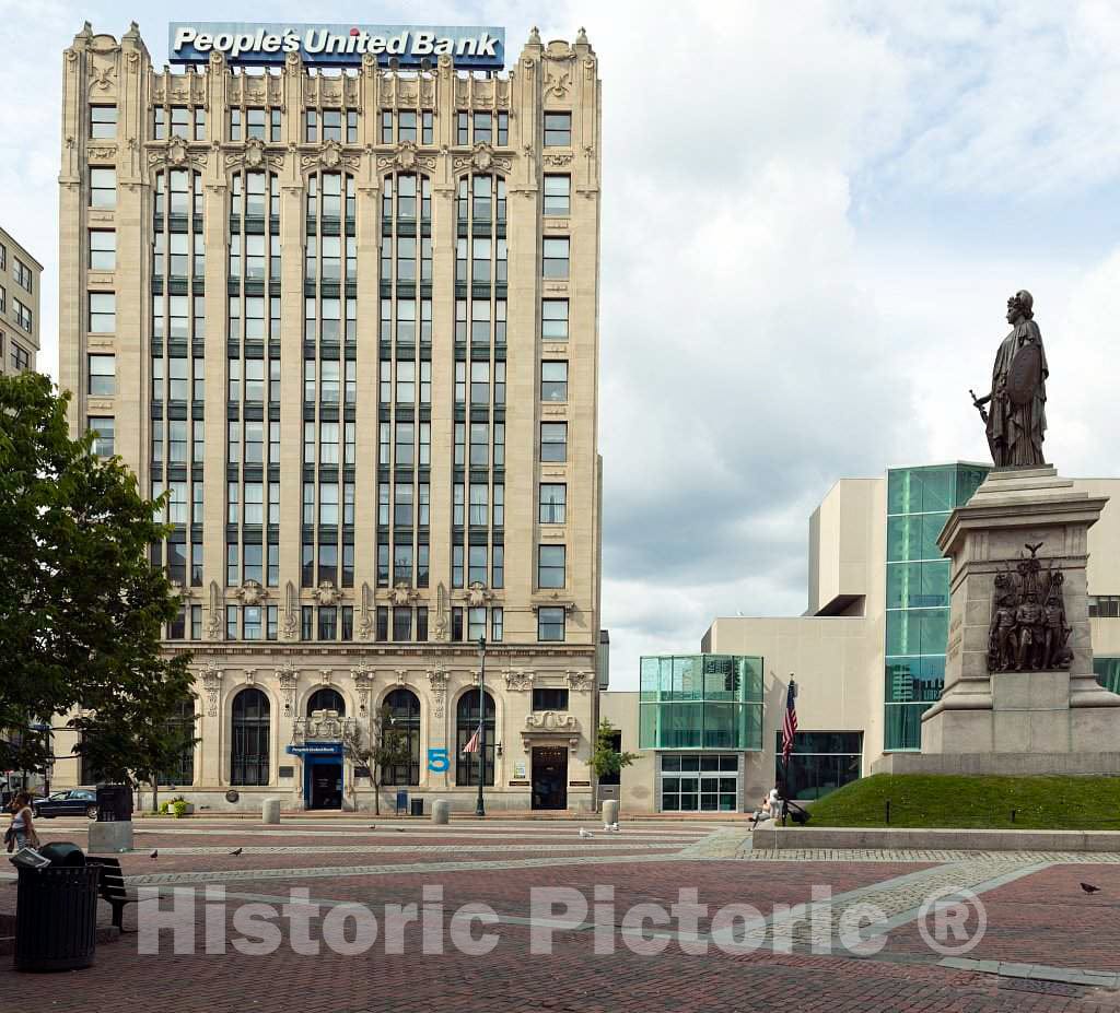 Photograph- Franklin Simmons's Portland Soldiers and Sailors Monument was built in 1891 in Portland, Maine's, Monument Square, now home to the city's main public library (right background)