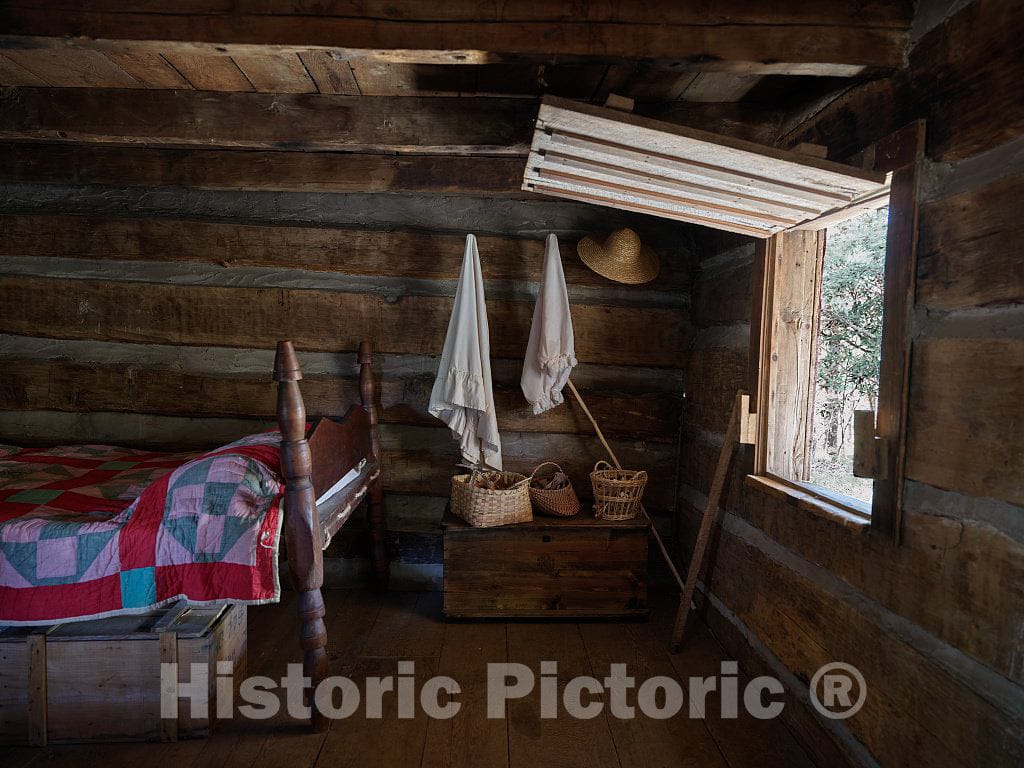 Photo- Carefully reconstructed and reimagined Interior of one of Several Rustic, one-Room Cabins at The Hickory Ridge Living History Museum in Boone, North Carolina 3
