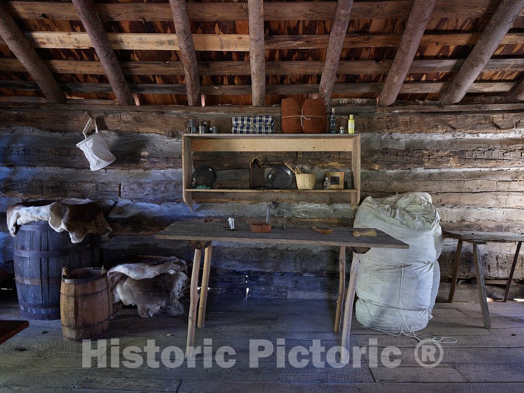 Photo- Carefully reconstructed and reimagined Interior of one of Several Rustic, one-Room Cabins at The Hickory Ridge Living History Museum in Boone, North Carolina 4