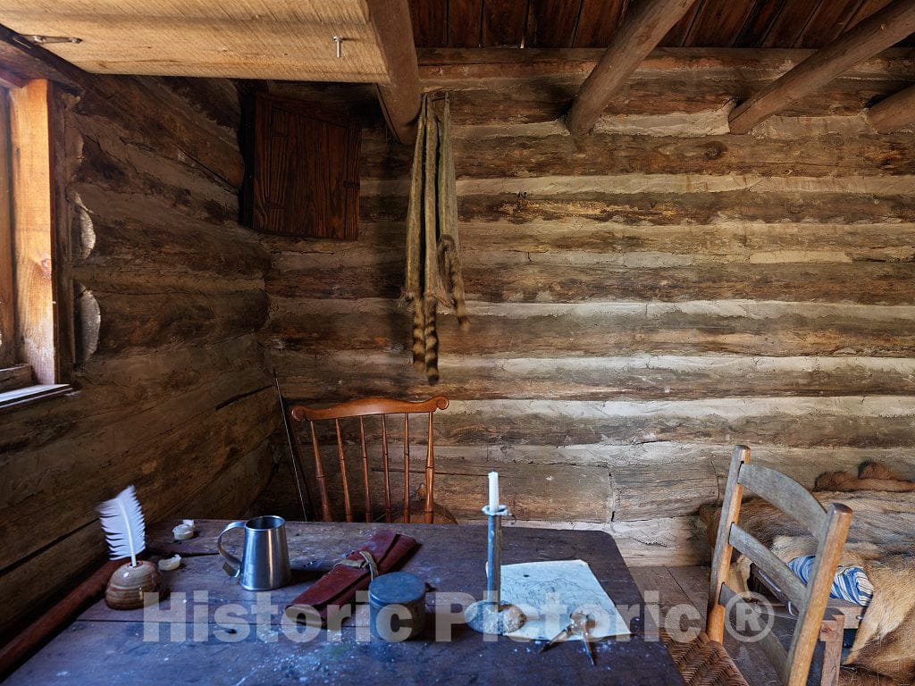Photo- Carefully reconstructed and reimagined Interior of one of Several Rustic, one-Room Cabins at The Hickory Ridge Living History Museum in Boone, North Carolina 7