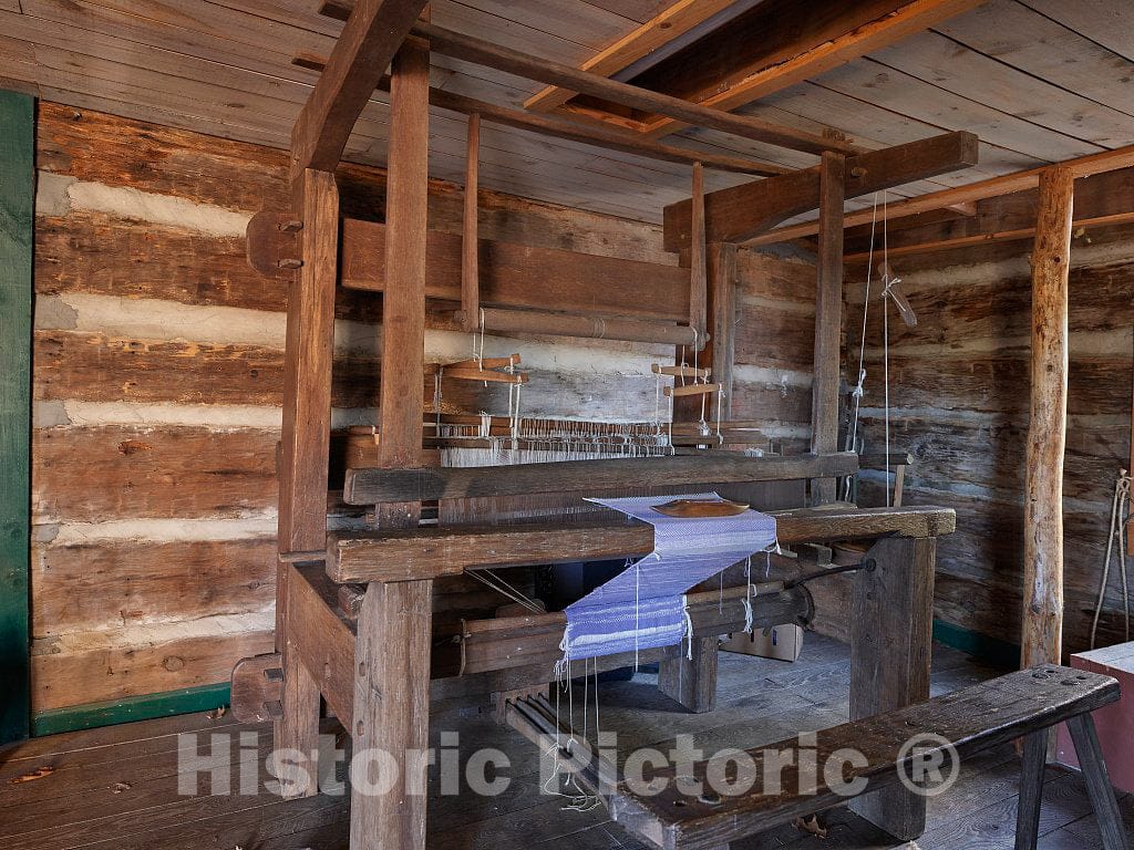 Photo- Carefully reconstructed and reimagined Interior of one of Several Rustic, one-Room Cabins at The Hickory Ridge Living History Museum in Boone, North Carolina 8