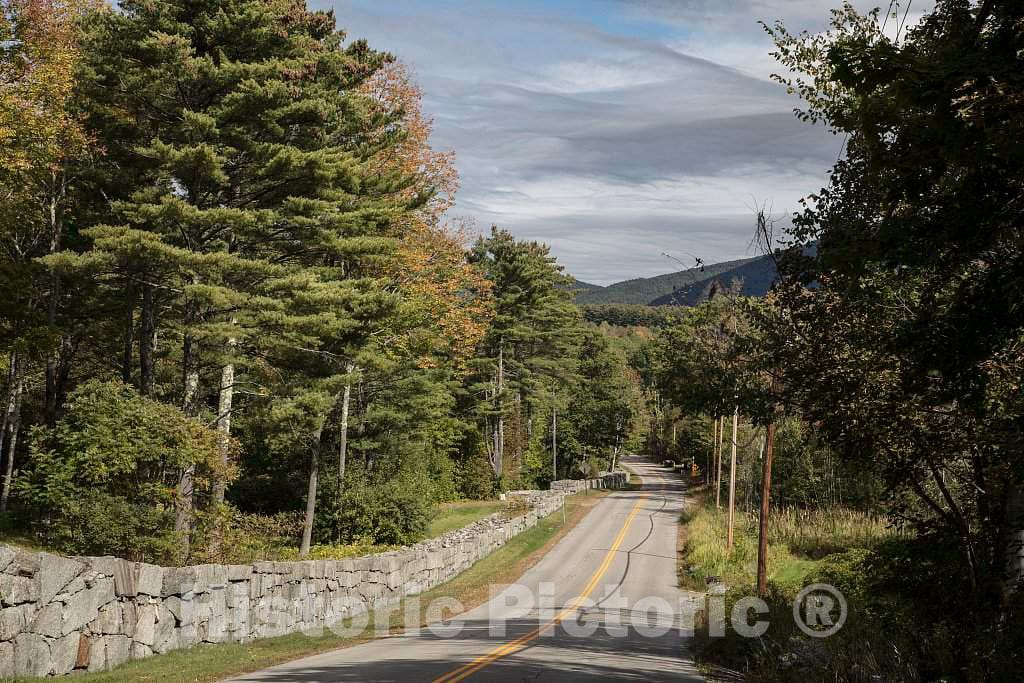 Photo - A stone wall,known locally as the Great Wall of Sandwich, runs along a pond road near Sandwich, New Hampshire- Fine Art Photo Reporduction