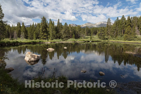 Photo- Pond on the basecamp grounds at Outward Bound, a strenous outdoor leadership school and physical-training venue outside Leadville, high in Colorado's Rocky Mountains