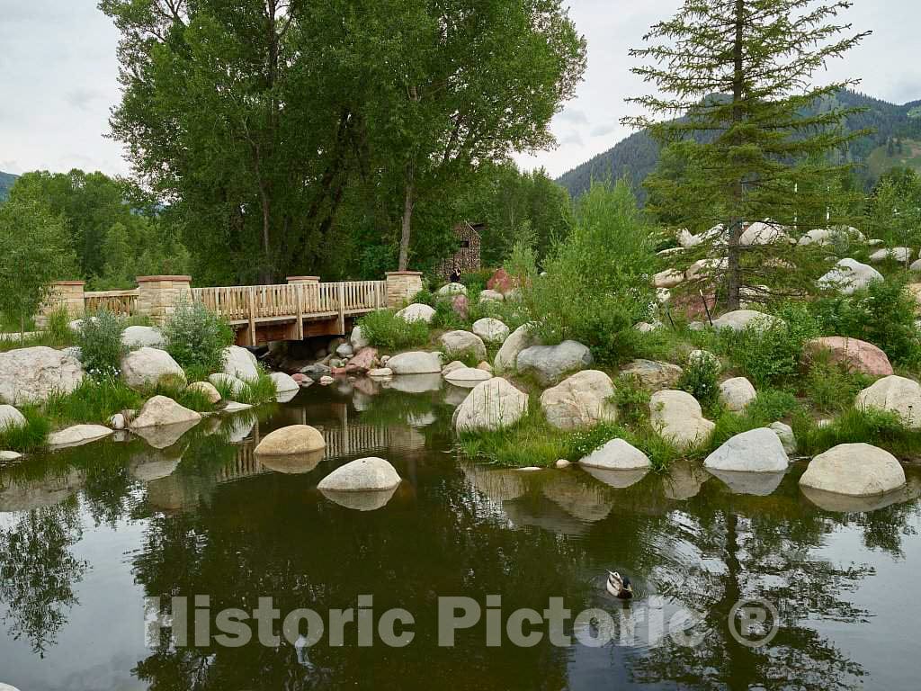 Photo - Lagoon and Pedestrian Bridge in The John Denver Sanctuary, Named for The Popular Singer who Lived in and sang About Colorado, in The Old Mining Town of Aspen