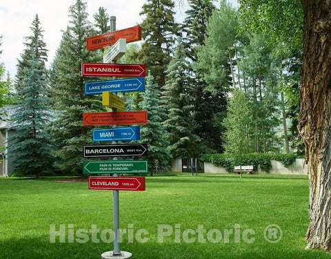 Photo - Signs to lots of places in the old mining town of Aspen, now a popular arts and skiing destination- Fine Art Photo Reporduction