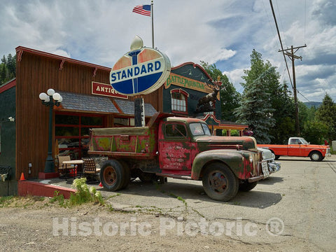 Photo - A well-used truck stands in front of the Battle Mountain Trading Post in Minturn, Colorado- Fine Art Photo Reporduction