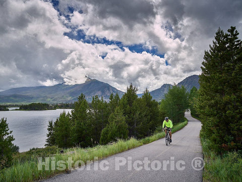 Photo- A cyclist approaches on the bike trail along Dillon Reservoir, outside Frisco, Colorado 2 Fine Art Photo Reproduction